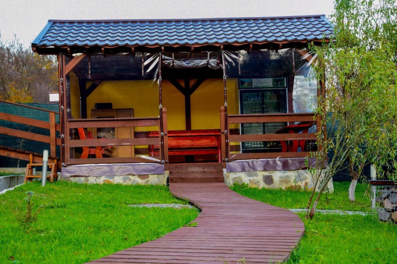 Green Property Dofteana Luaran gambar